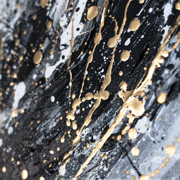 Goldene Farbspritzer abstrakte Acrylkunst Nahaufnahme Detail